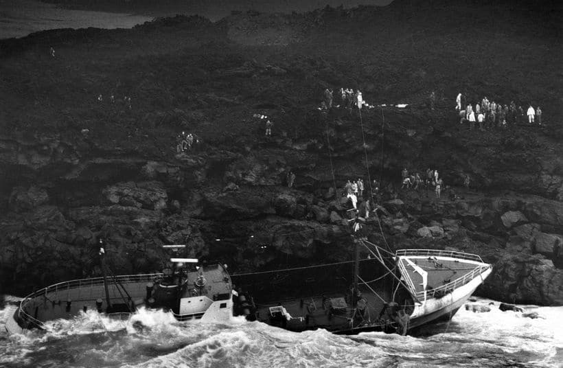 Locals gather on the cliffs during the Pelagus rescue operation.